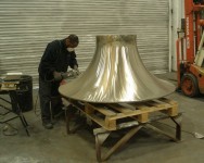 The stainless steel casting being polished