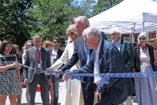 Ribbon cutting by Mr. & Mrs. Weston and William Pye